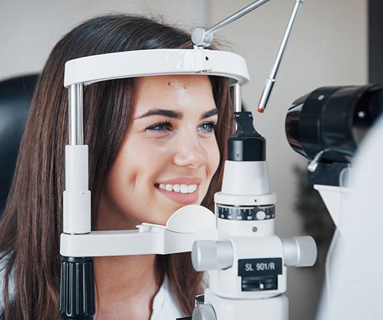 Woman getting an eye exam